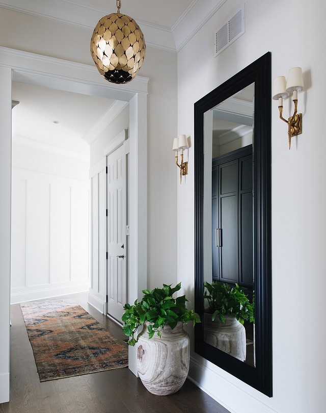 Full-length mirror in entryway